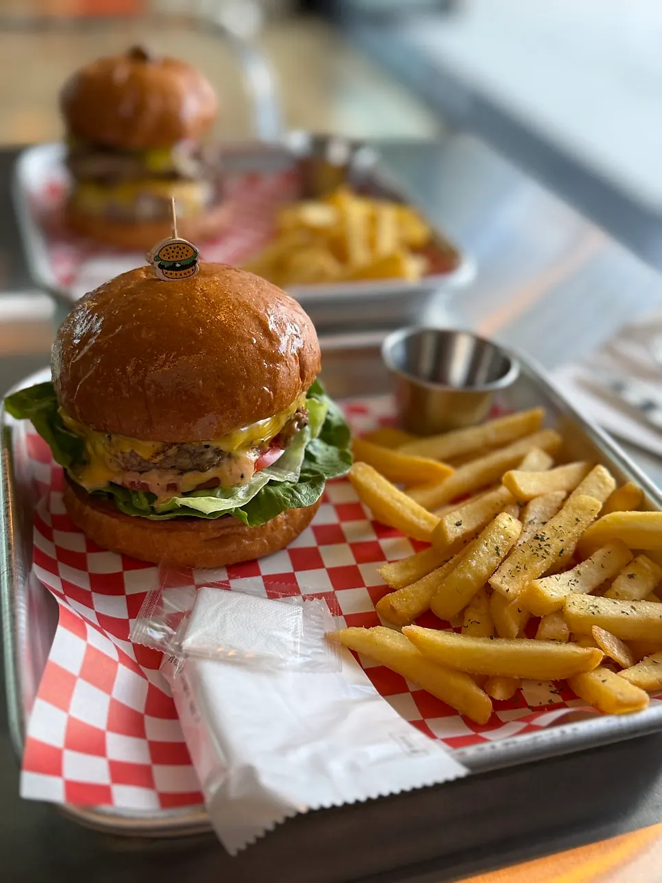 Table set with the ordered burgers