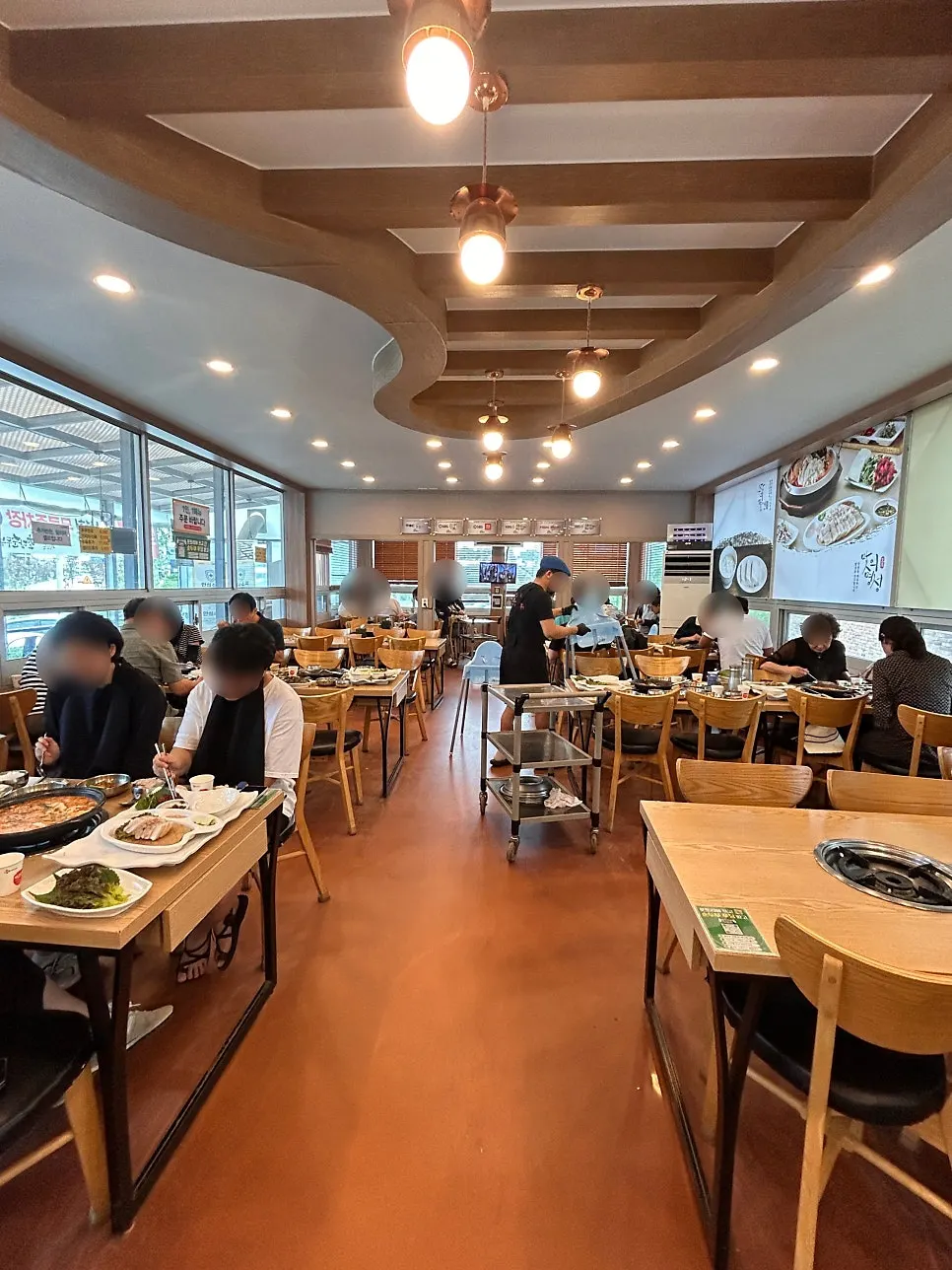 Interior of the restaurant crowded with customers