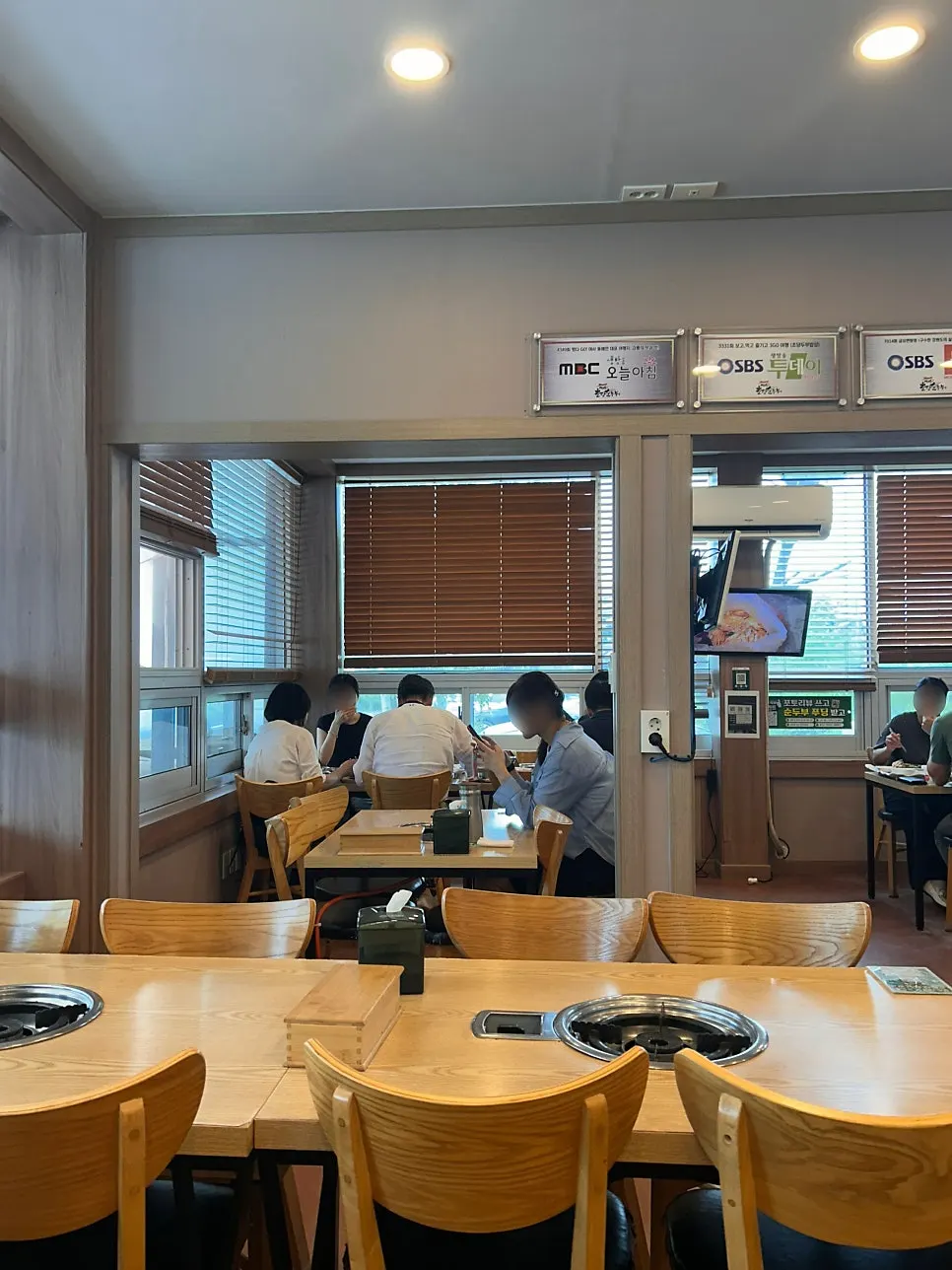 Interior with TV appearance credentials on display