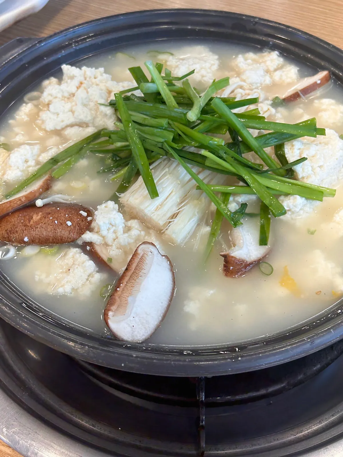 Chodang sundubu jjigae in white broth