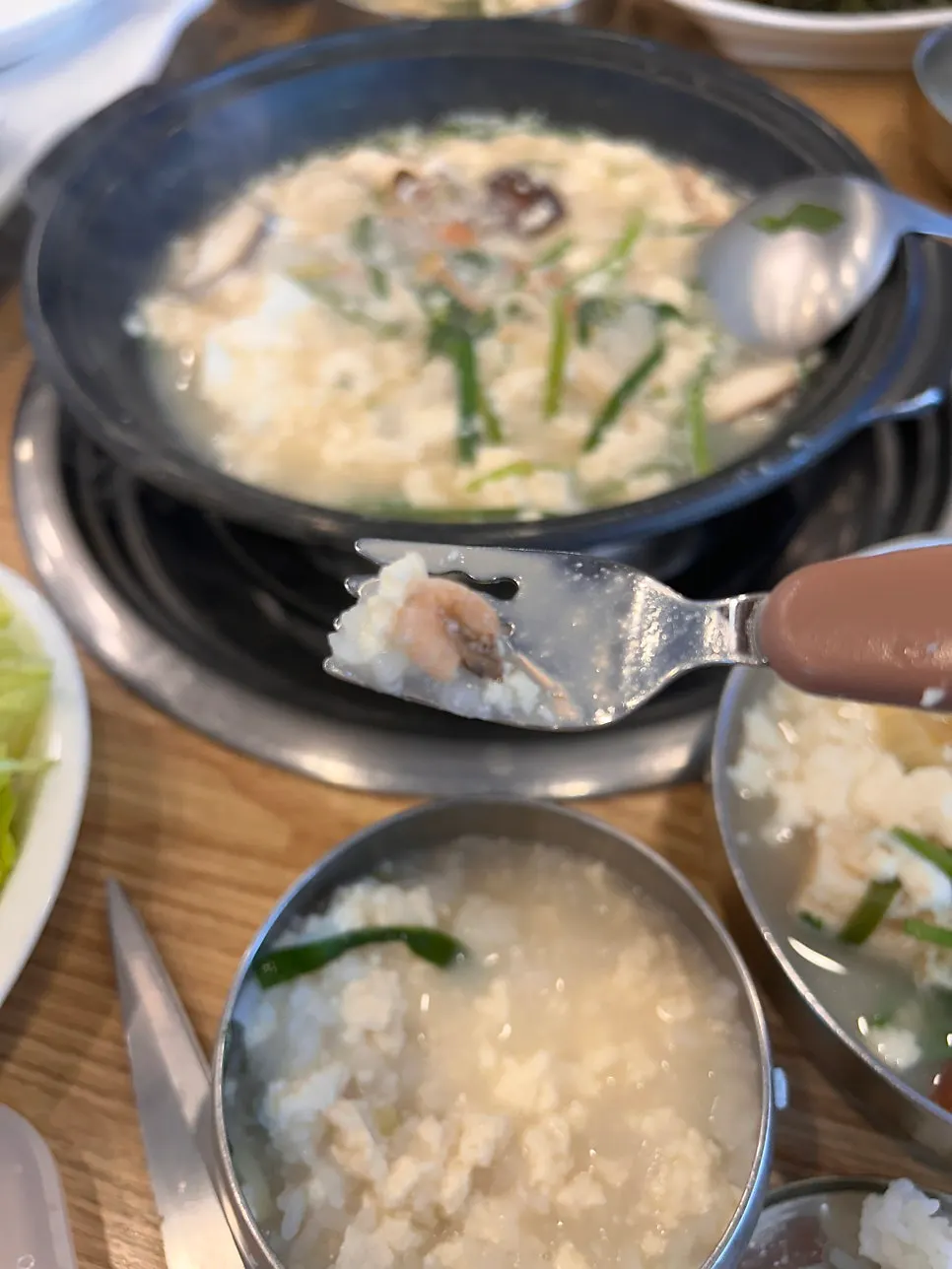 Plump crab meat on top of the sundubu jjigae