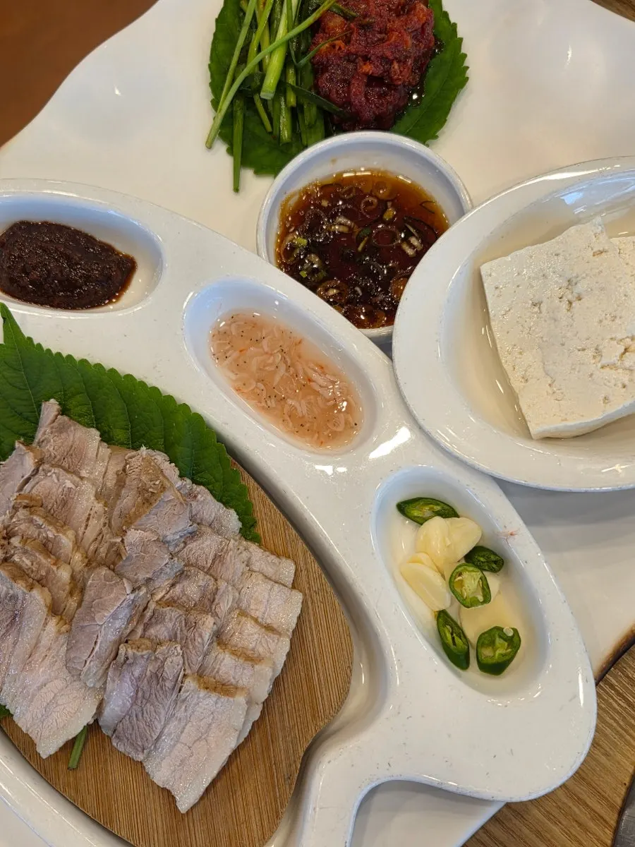 A plate of tofu samhap with tofu and boiled pork