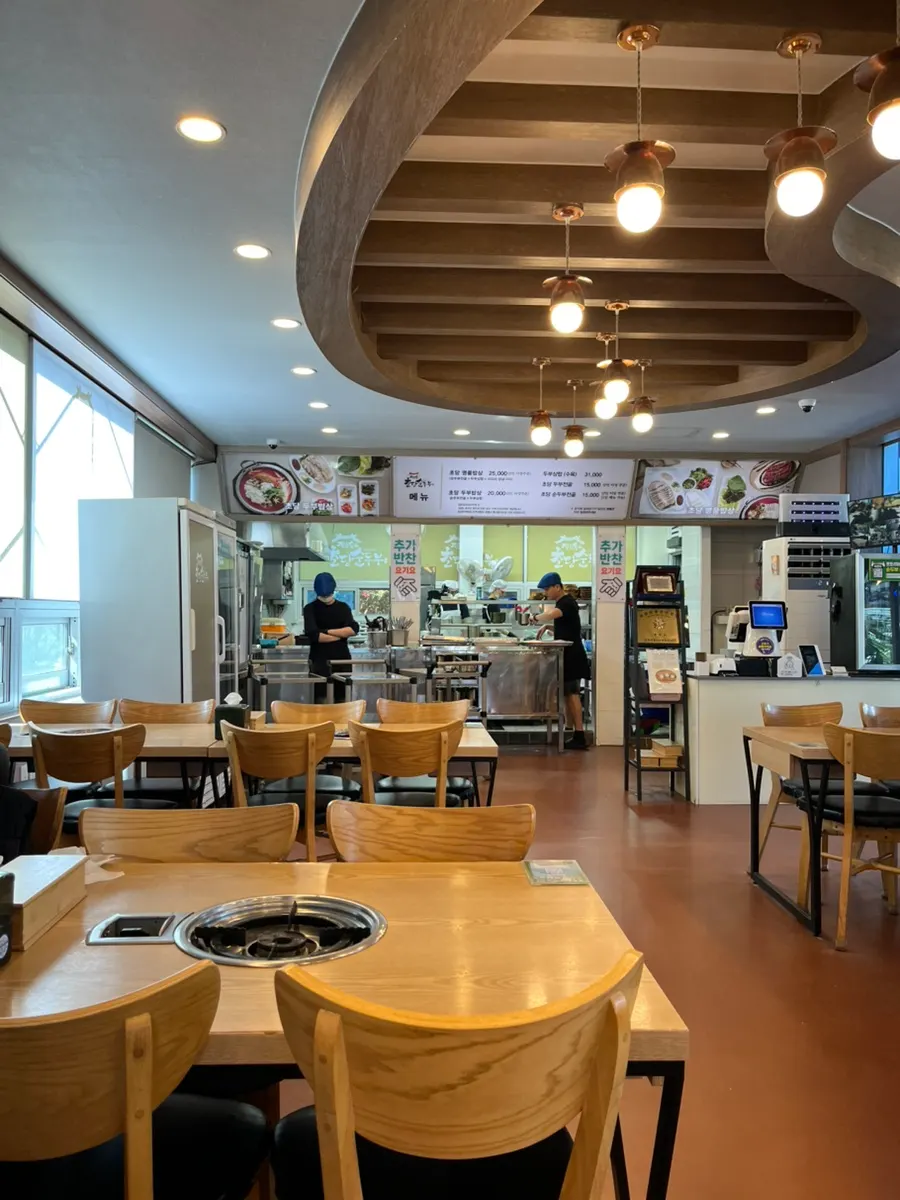Wood-toned interior of Jeong Eunsuk Chodang Sundubu