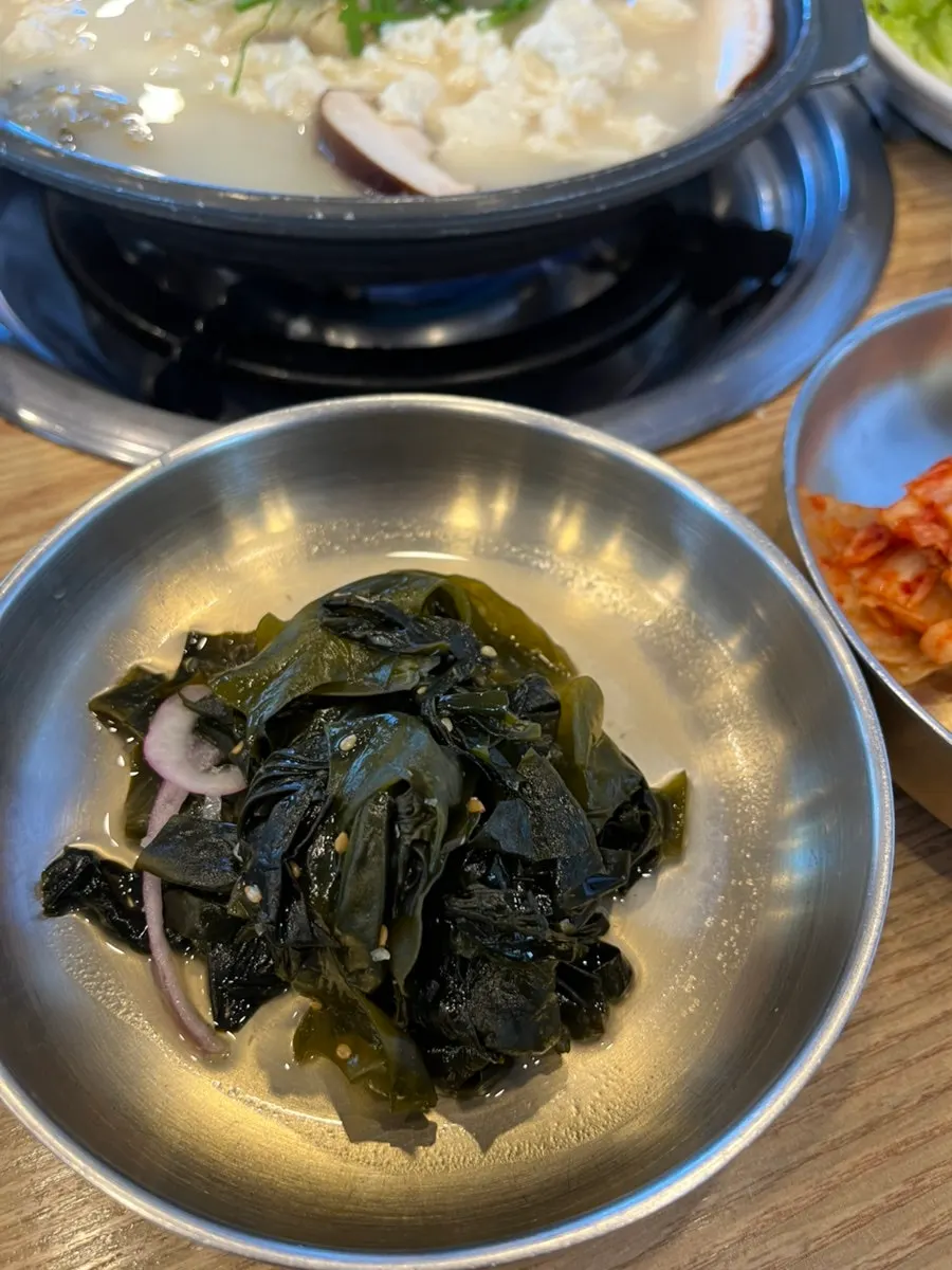 Bossam served with gajami sikhae and kimchi
