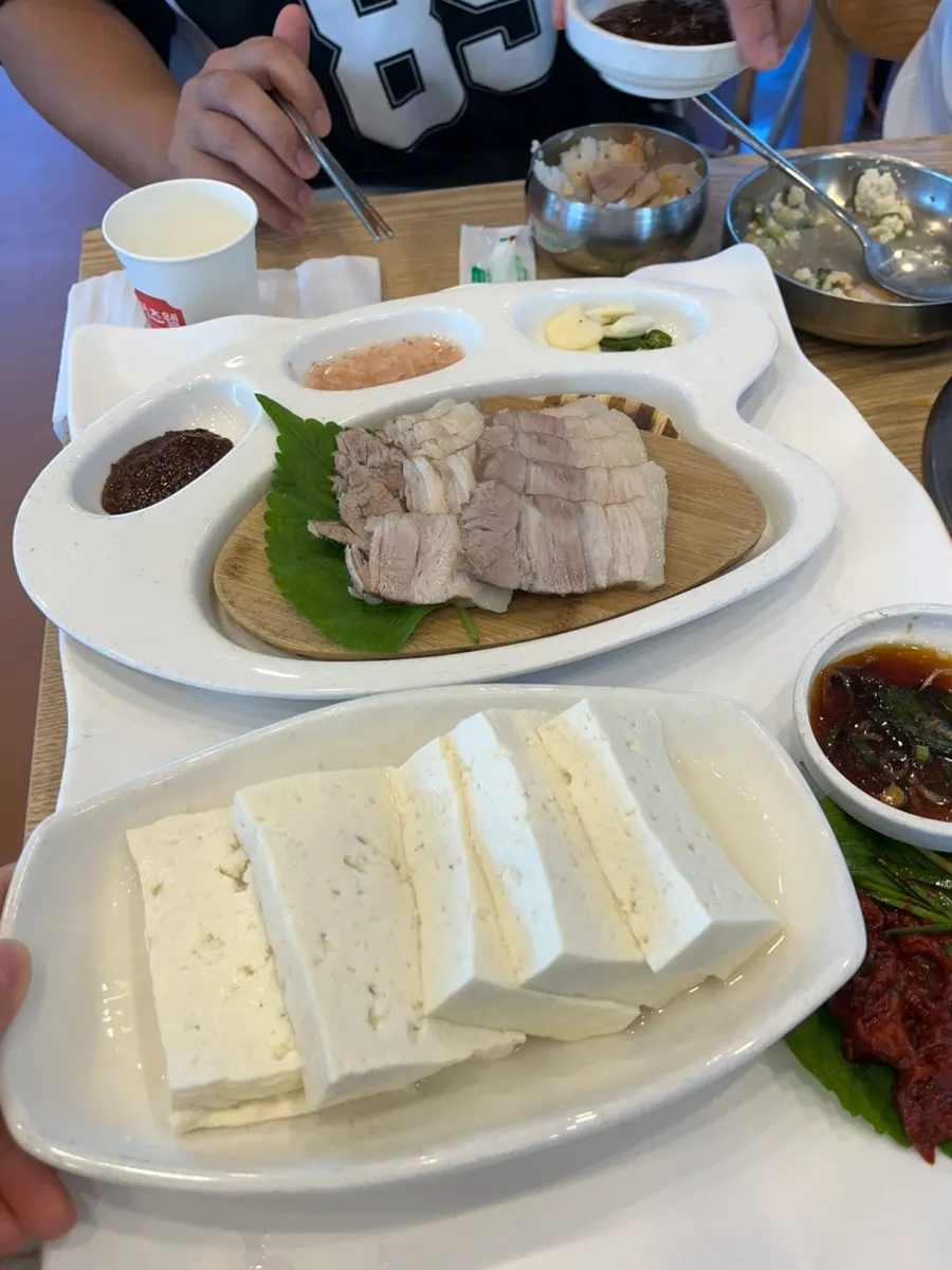 Sundubu hot pot turned spicy after mixing in seasoning sauce