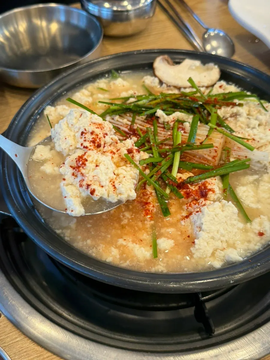 Scooping up a spoonful of sundubu