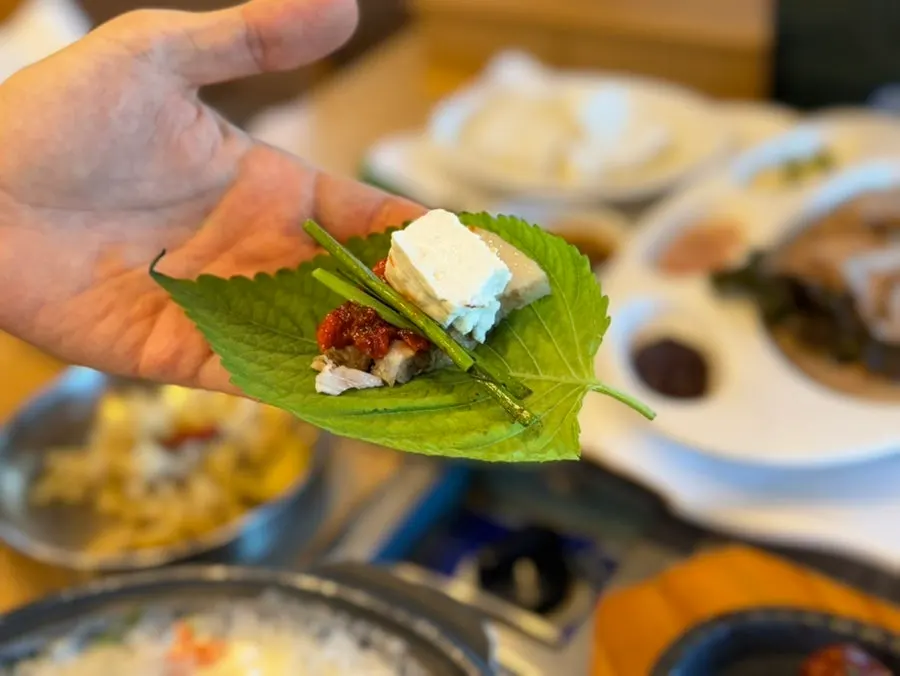 A bite-sized wrap of tofu samhap