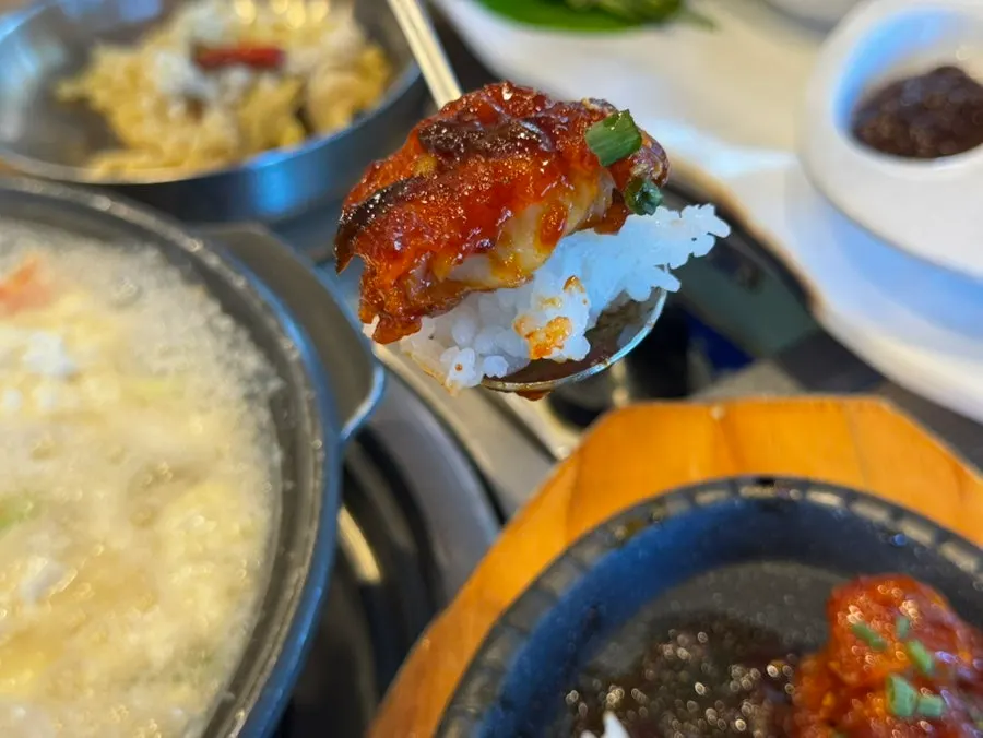 Grilled seasoned pollock piled on white rice