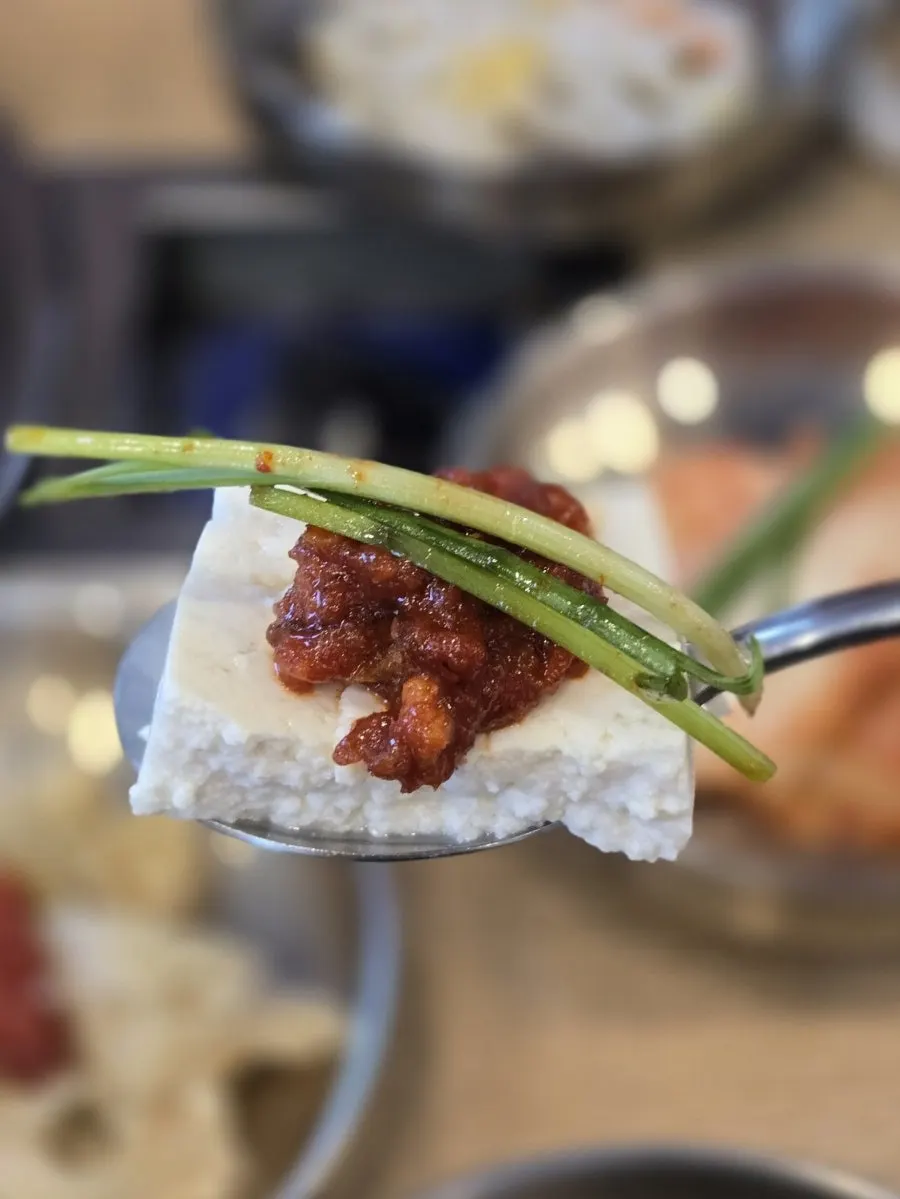 Tofu samhap made up of boiled pork, tofu, and gajami-sikhae