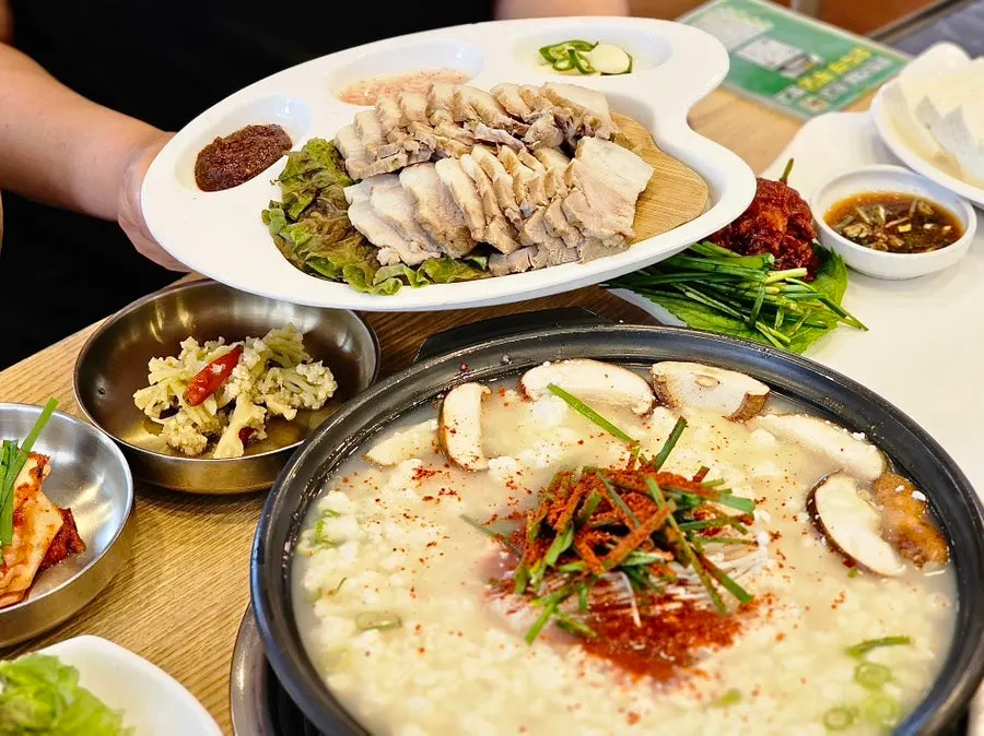 Spicy braised pollock served with a bowl of rice