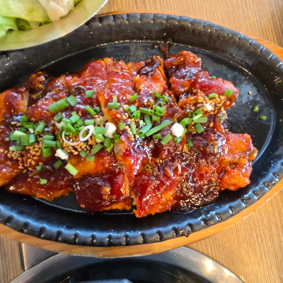 Braised kodari with sauce on top