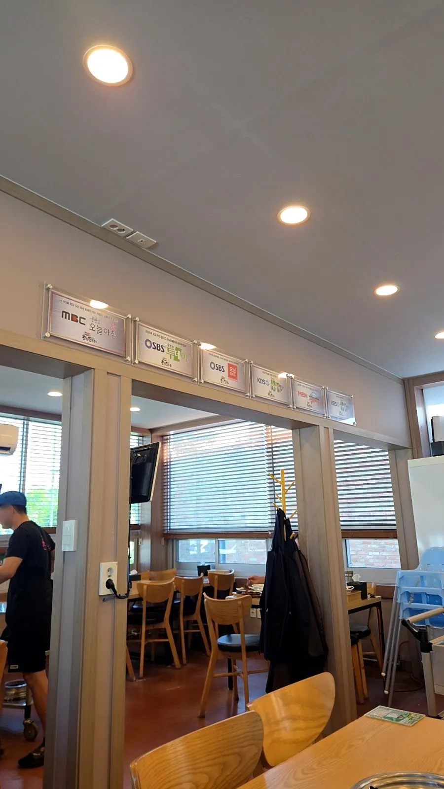 Restaurant wall displaying master chef certification materials