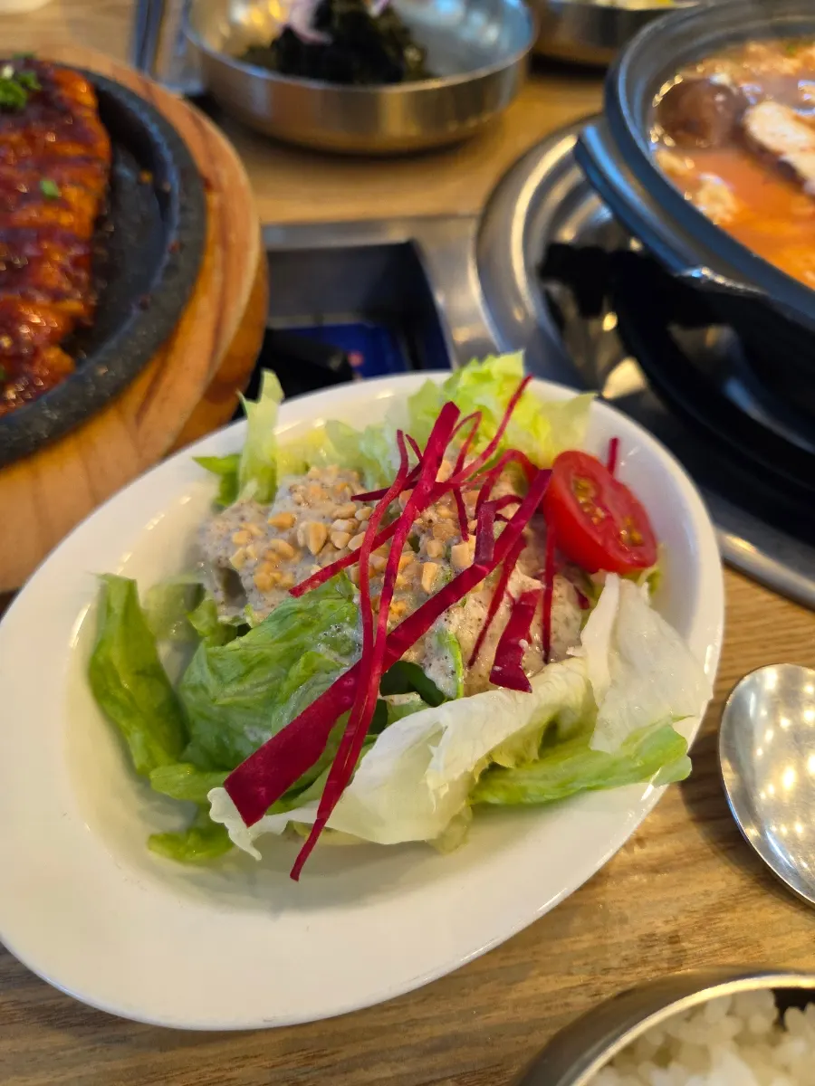 Table spread with sundubu jjigae added