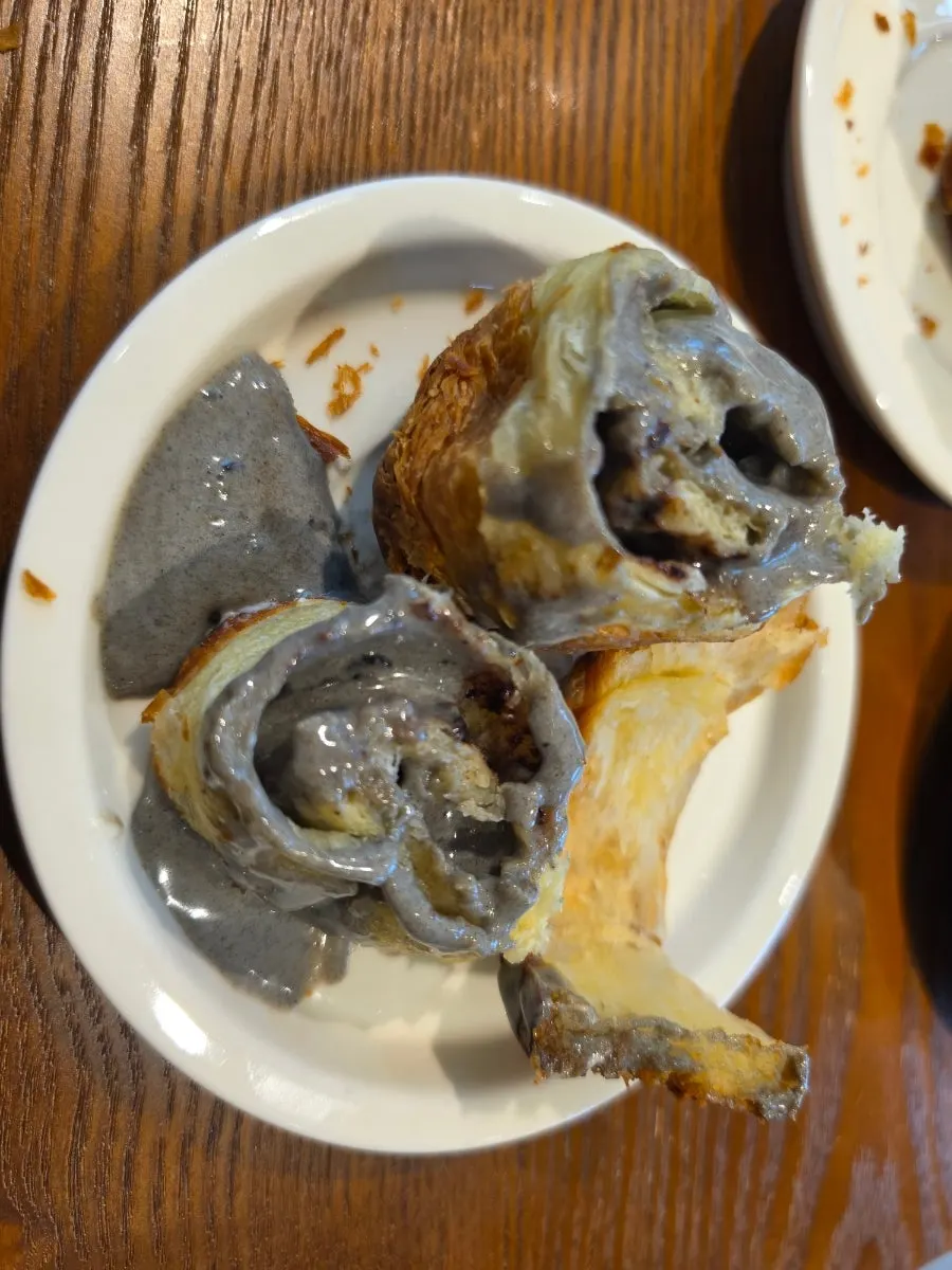Black sesame cruffin served with coffee