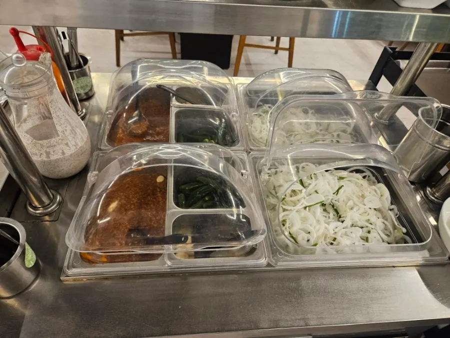 Salad, japchae and other banchan at Chodang Uga