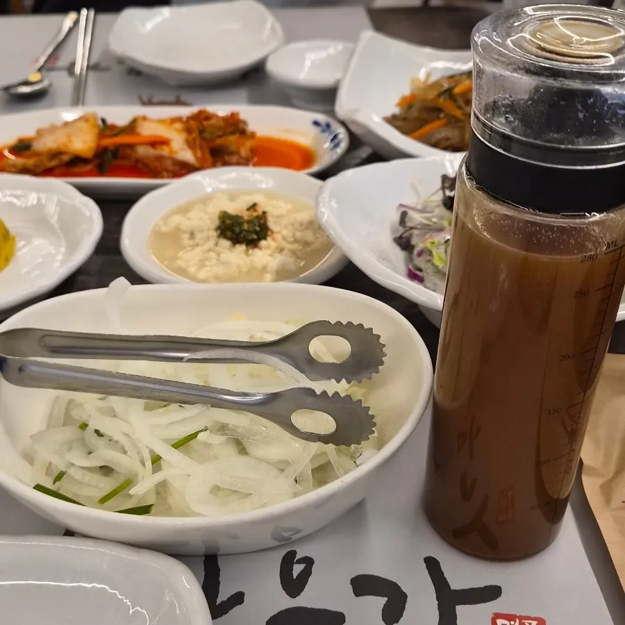 Full table setup with the woo-dae galbi and side dishes
