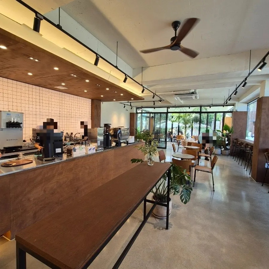 Wood-toned interior of Coffee Dripper