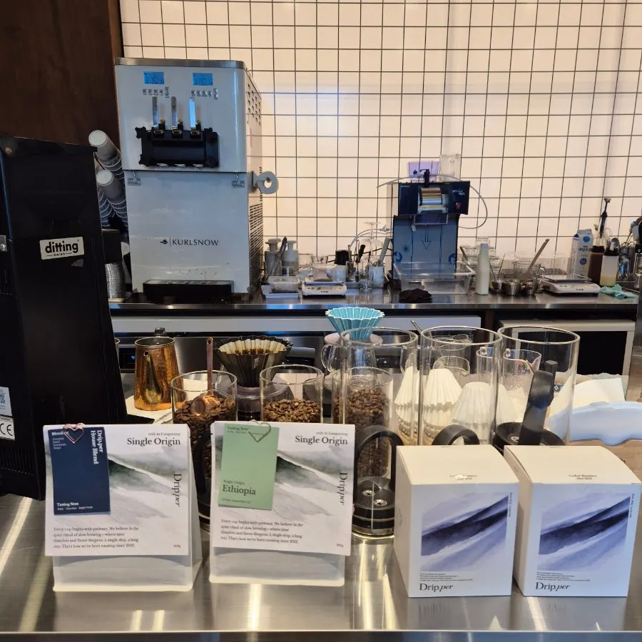 A table set with drinks at Coffee Dripper