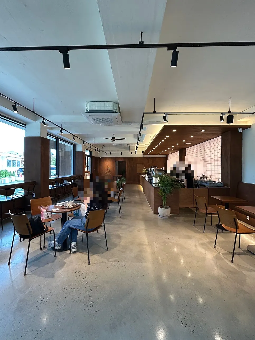 Coffee Dripper's wood-toned interior space