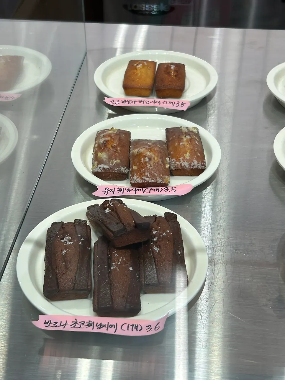 Croffins and baked goods displayed in the showcase