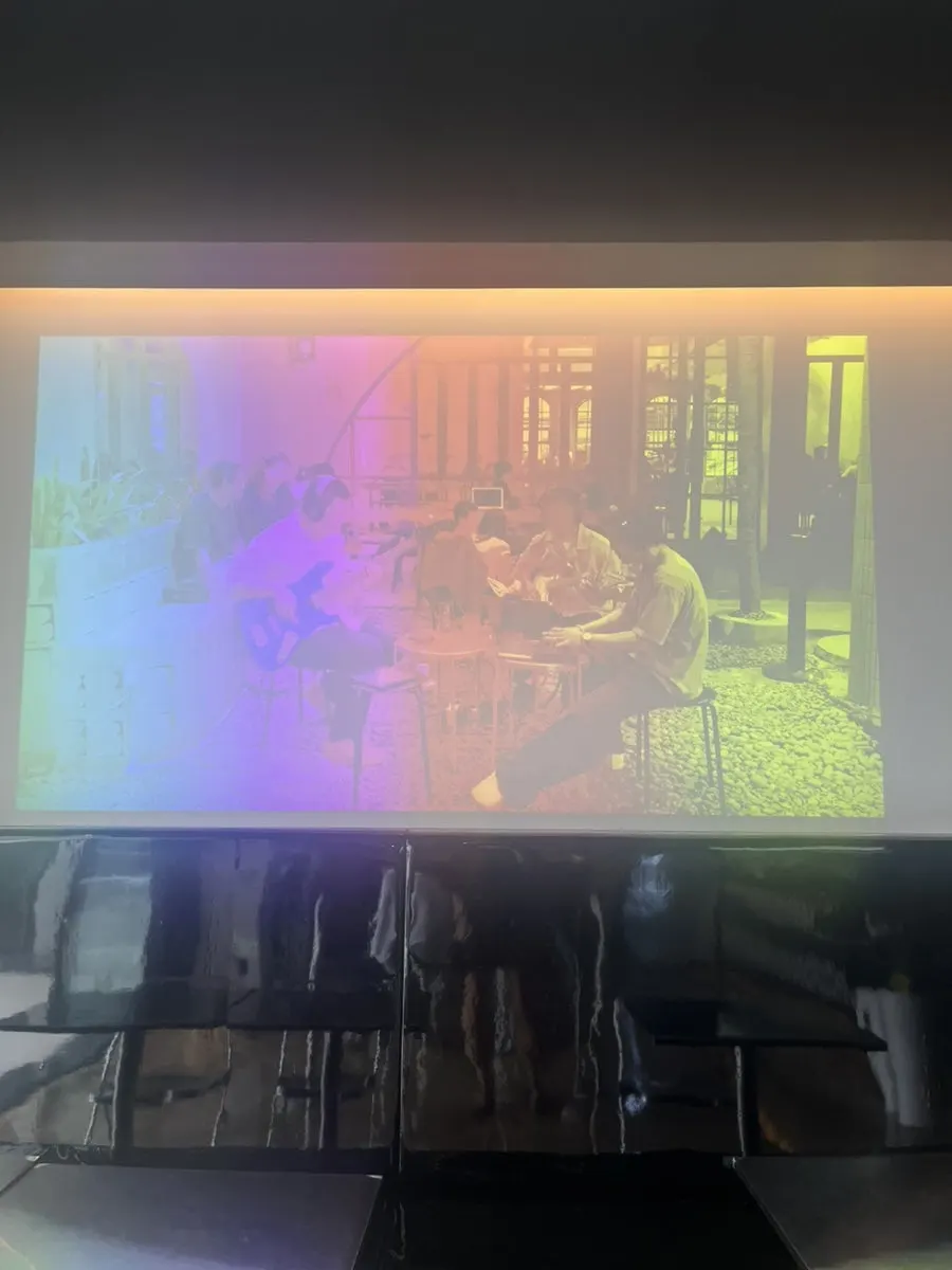 Moana Burger dining hall with a large screen