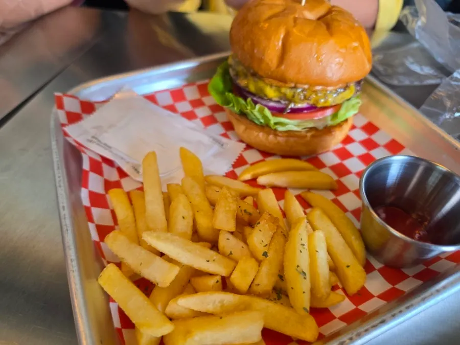A plate with the Hawaiian Burger and fries