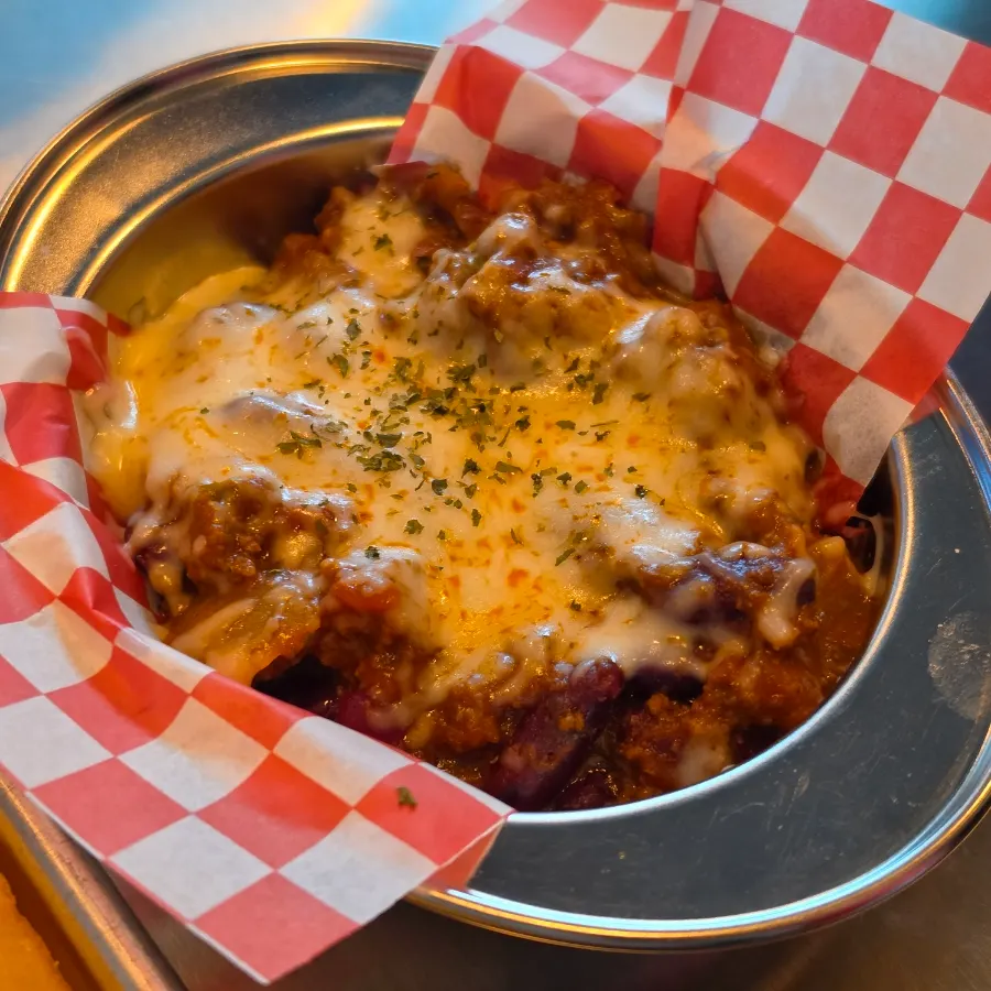 Chili bean sauce piled with cheese