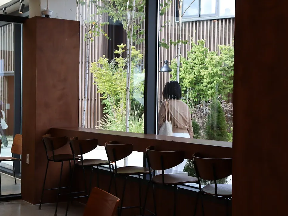 Window-side seating inside the café