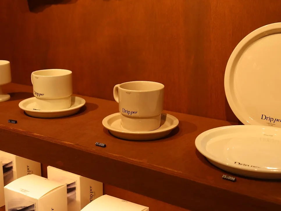 Corner selling café goods like cups and t-shirts