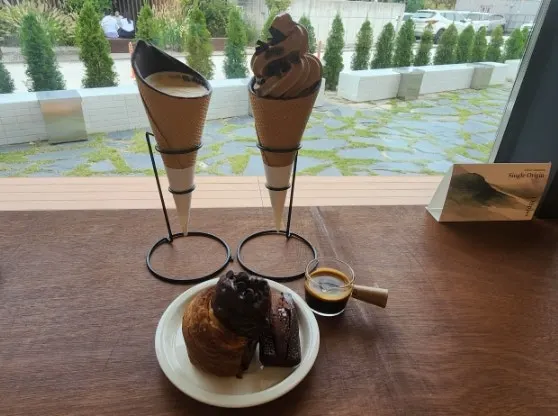 Shared sink installed centrally outside the restrooms