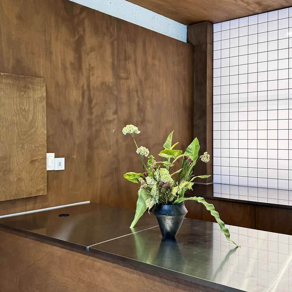 Corner of the café interior with plants