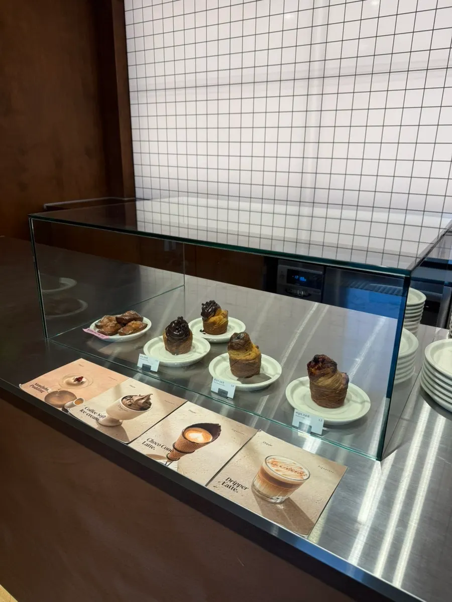 Order counter and menu board at Coffee Dripper