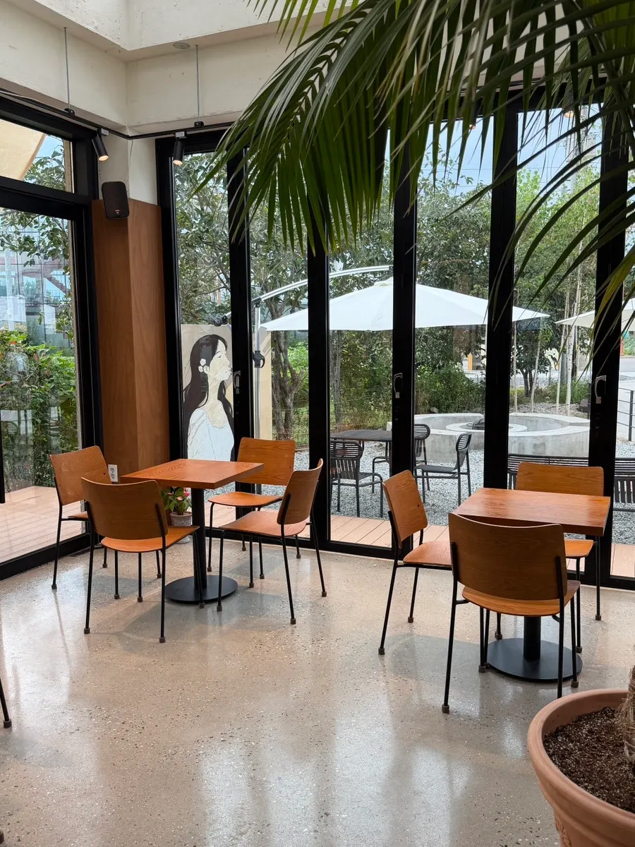 Café interior with window and table seating