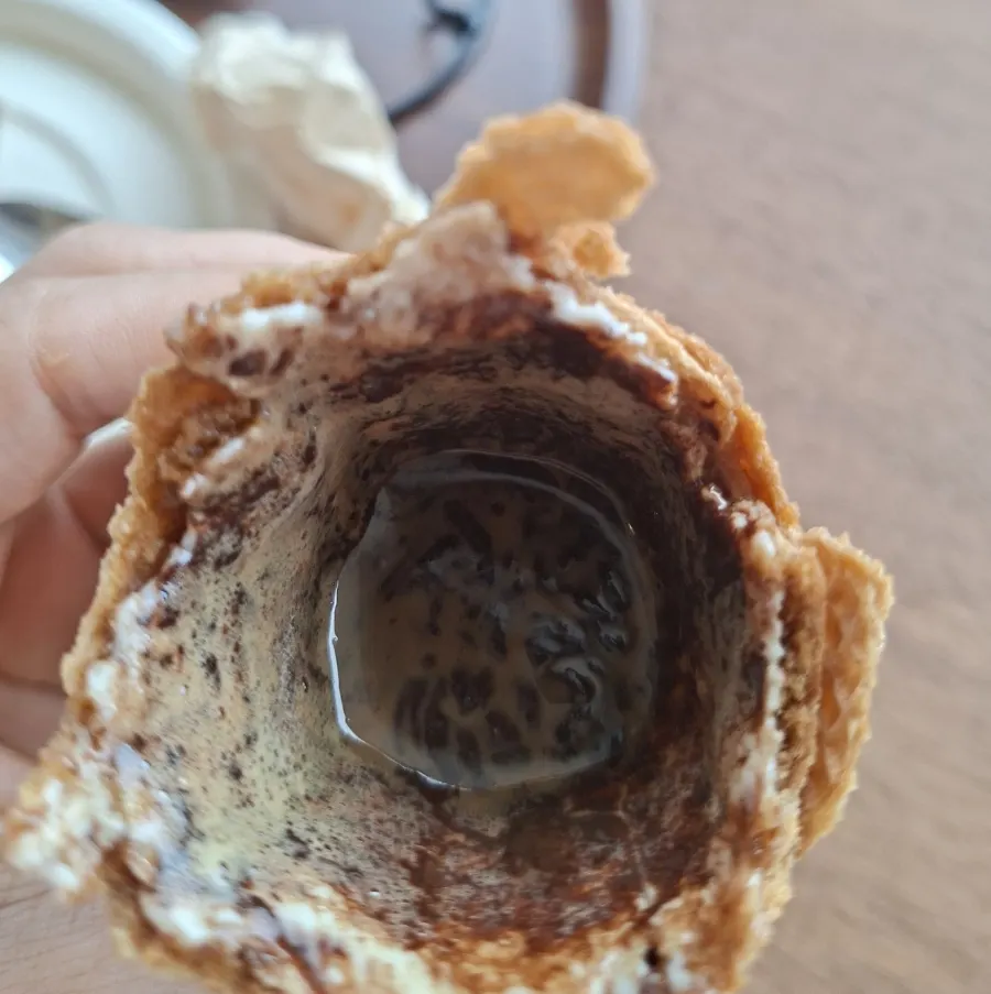 Cone latte with melting chocolate coating
