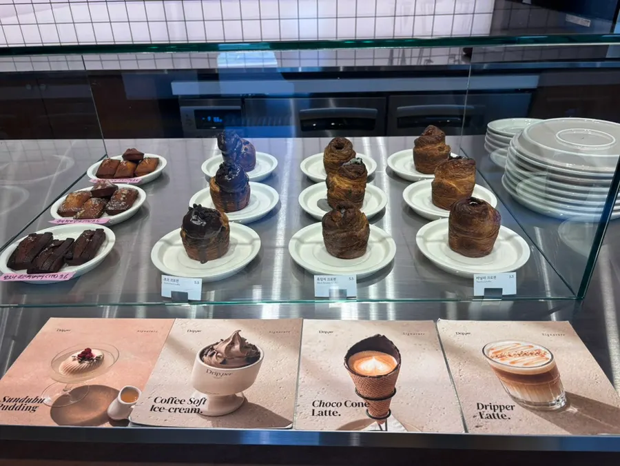 Teacups and plates for sale in a corner of the café