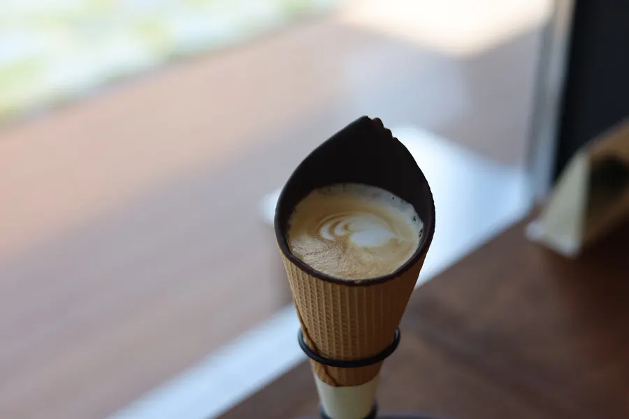 Cone choco latte topped with heart latte art