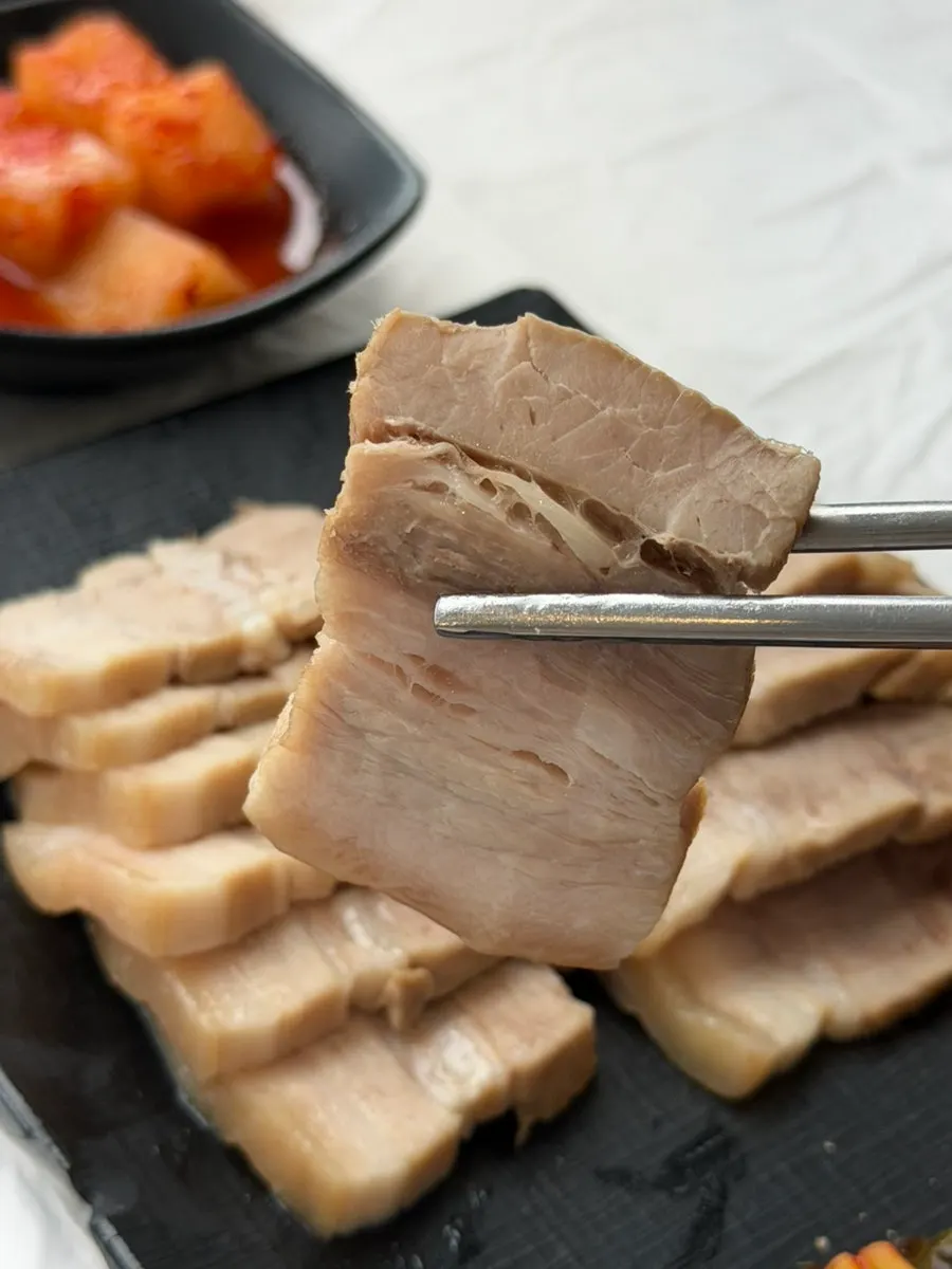 Boiled pork served with salted shrimp and ssamjang