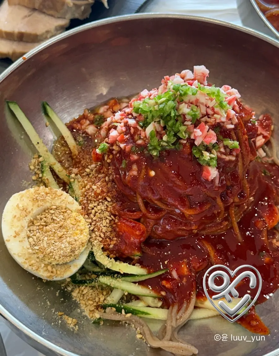 Spicy bibim guksu topped with sauce