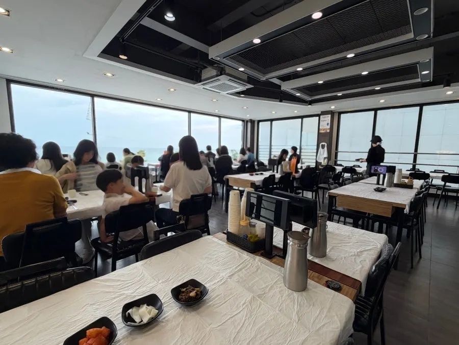 Interior of Gossi's Donghae Makguksu Main Branch with spacious table layout