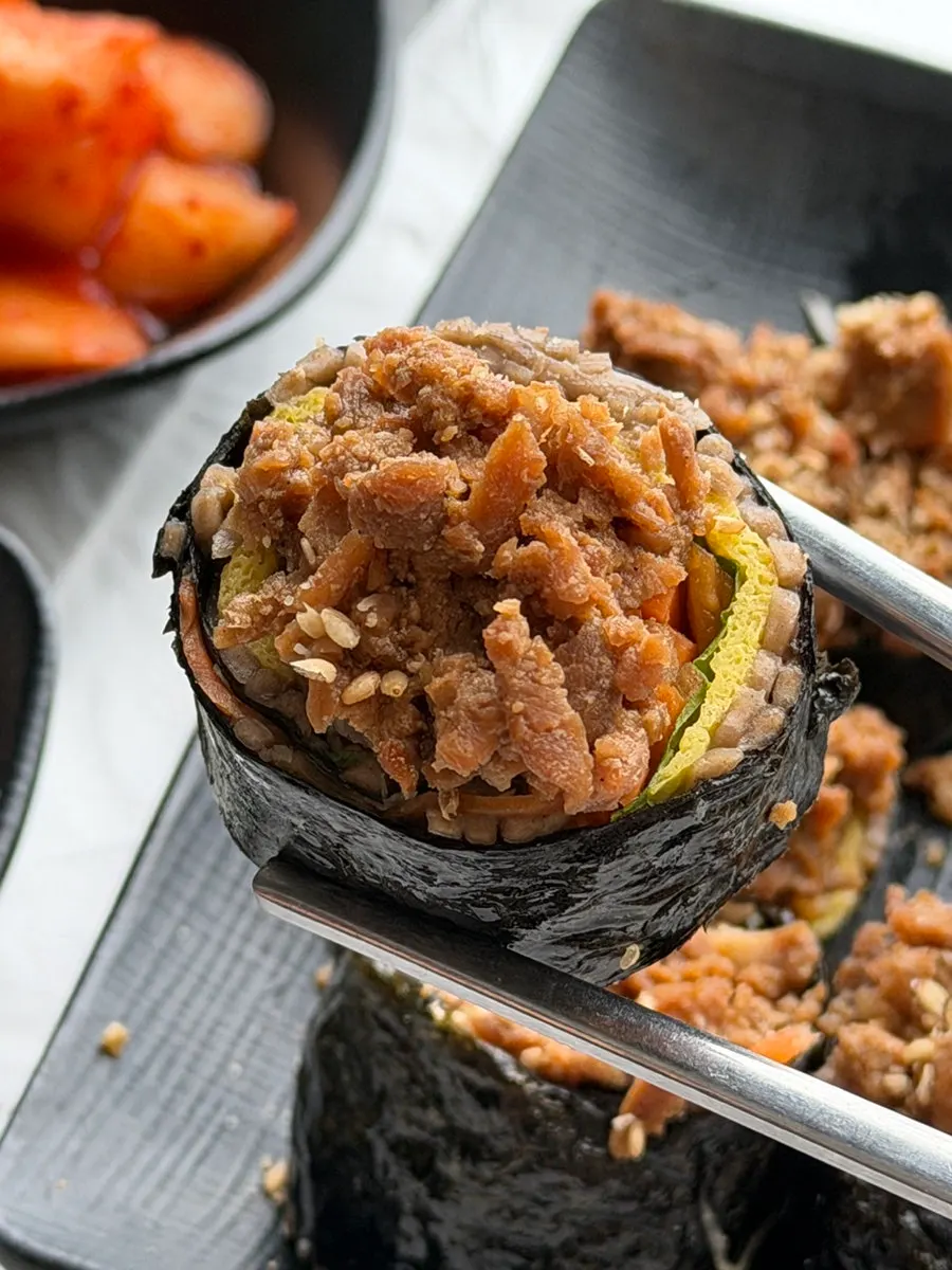 Cross-section of soy-marinated pork buckwheat gimbap