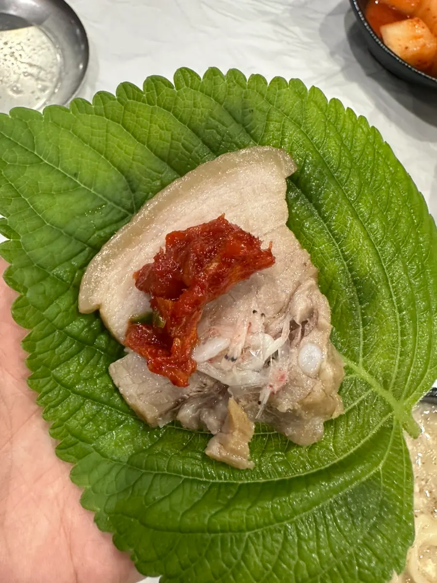 Pork wrapped in lettuce and perilla leaves