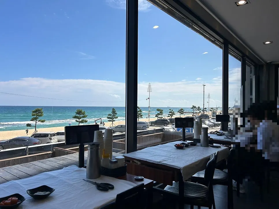 Ocean view of Gangmun Beach seen through the restaurant window