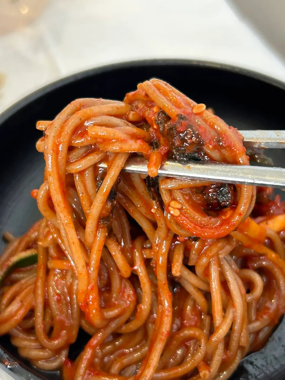 Bibim makguksu mixed with sauce