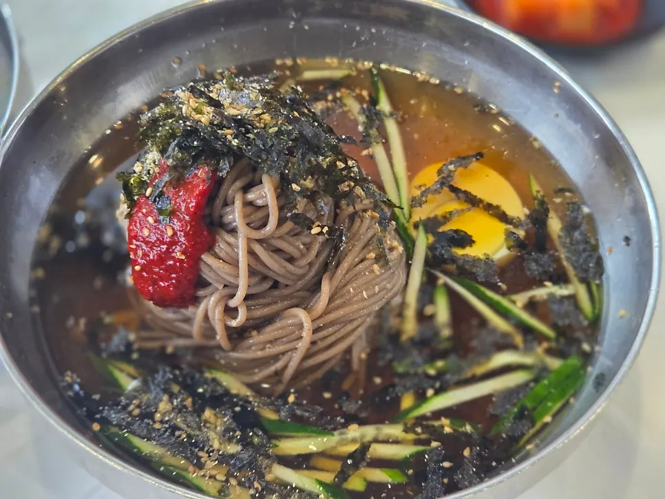 A bowl of water makguksu with kelp-and-soy-based broth