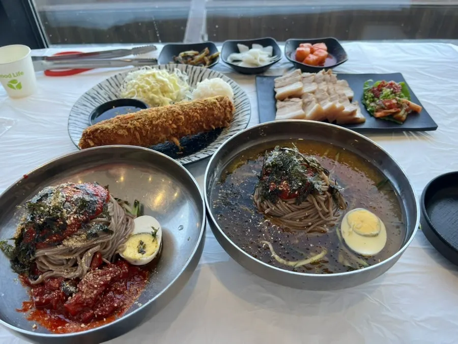 Side dish containers set out at the self-serve bar
