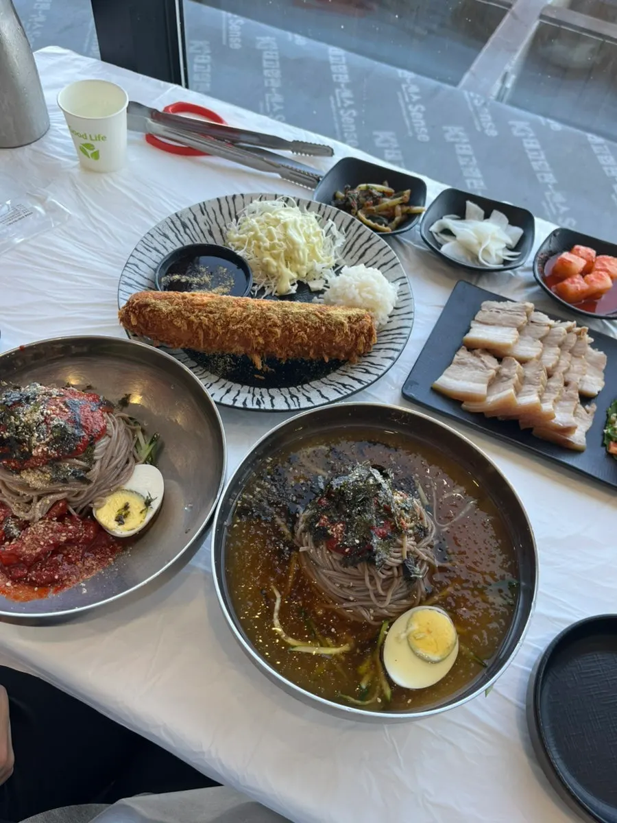 A full spread of the 2-person set laid across the table