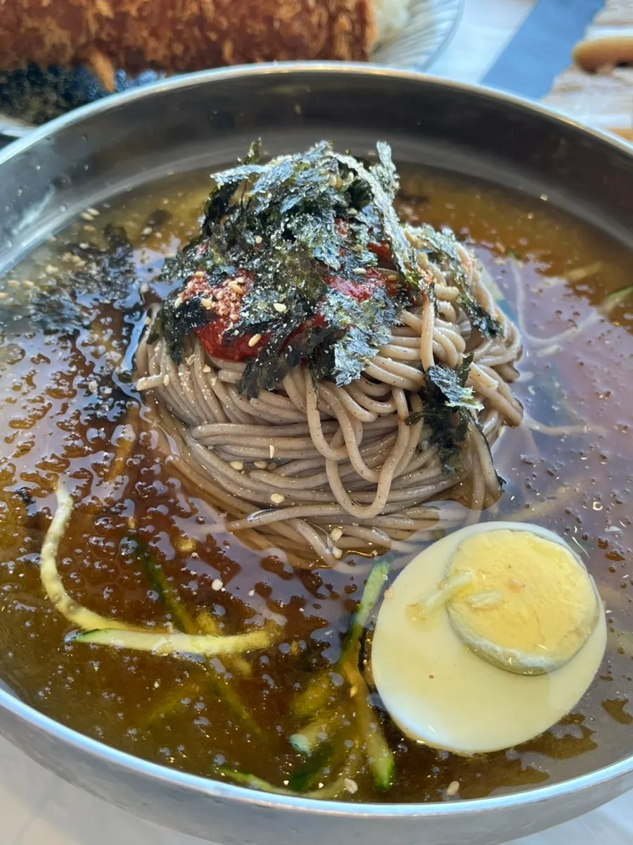 A meal set against the backdrop of Gangmun Beach