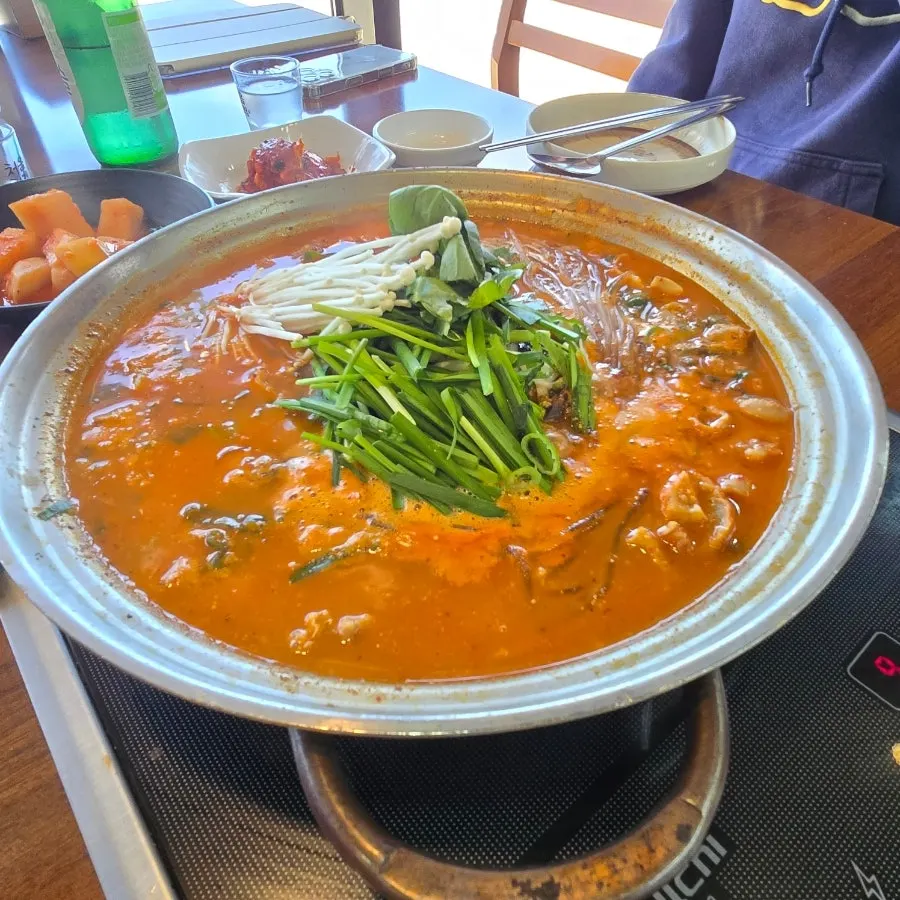 Pot of Matdeurin beef tripe hot pot on the table
