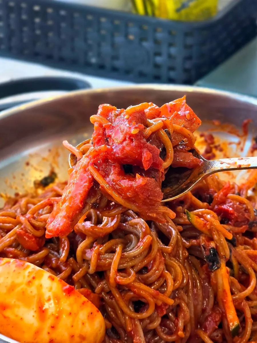 Mixed pollack sikhae bibim makguksu noodles