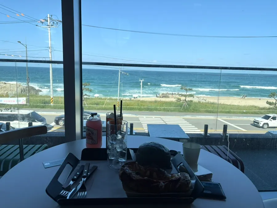 Window seat at Baegya Coffee with an ocean view